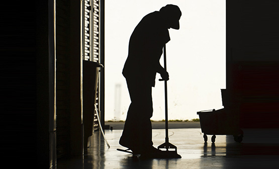 Man mopping the floor